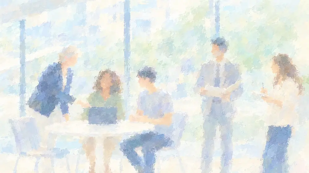 職場で複数の人が集まり、会話をしている様子を描いた淡い色調のイラスト